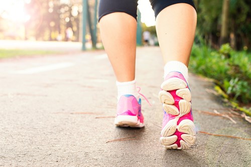 Close up of someone walking in trainers